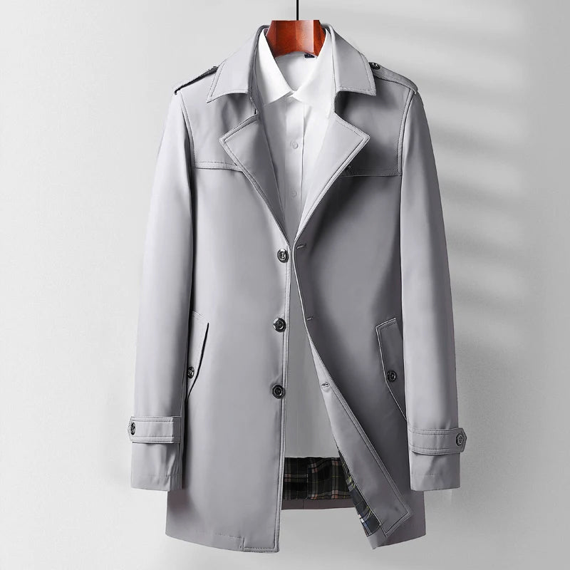 Beige men's heritage trench coat tailored urban silhouette with classic refined drape
