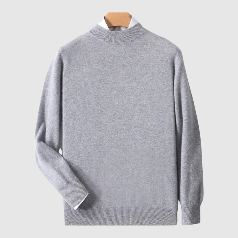Minimalist crewneck wool sweater in neutral tone, ribbed neckline and cuffs, slim streamlined knit fit