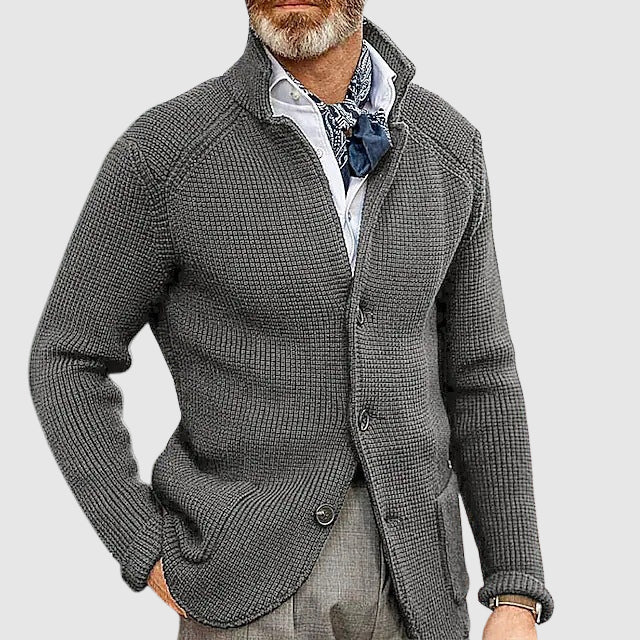 Ivory waffle-knit tailored button cardigan with soft lapel collar and structured silhouette
