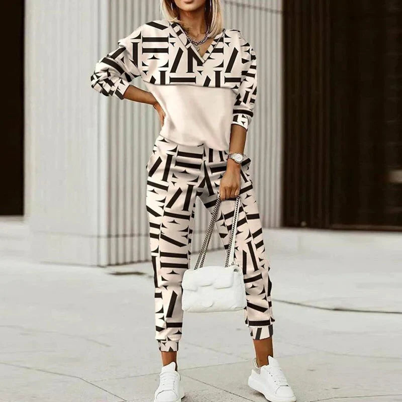 Women's relaxed fit zip tracksuit set with animal print accents in a bold two-piece style