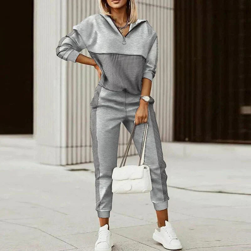 Women's relaxed fit zip tracksuit set with bold animal print accents two-piece lounge style