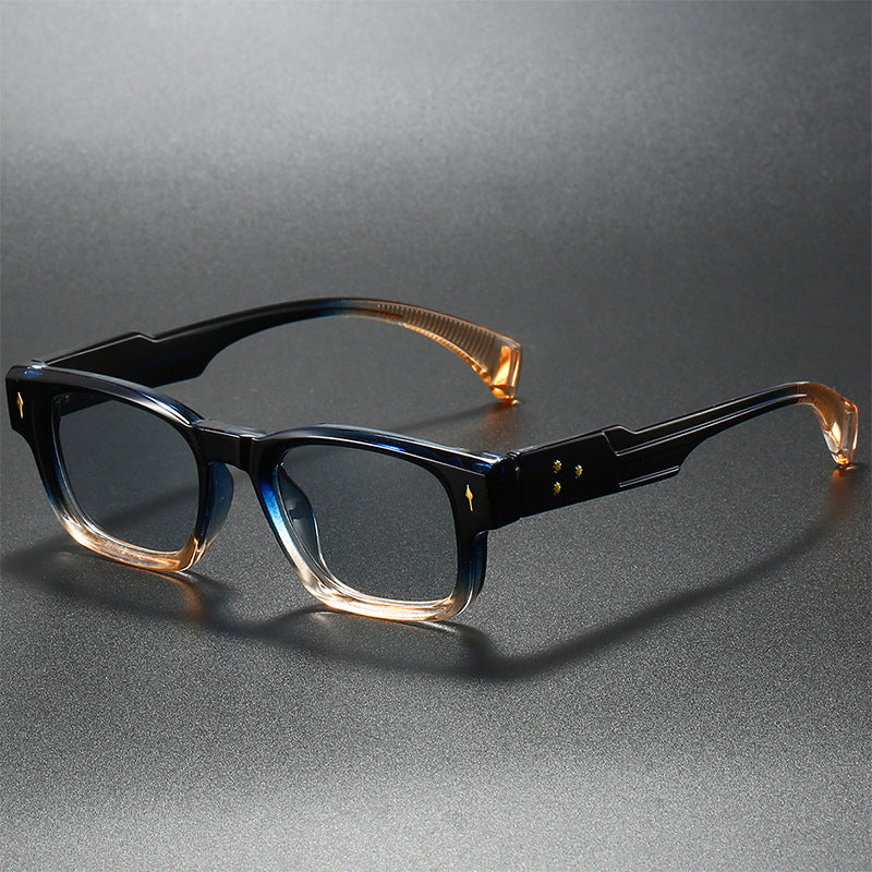 Matte black square sunglasses with thick temple arms and bold stud details for everyday style