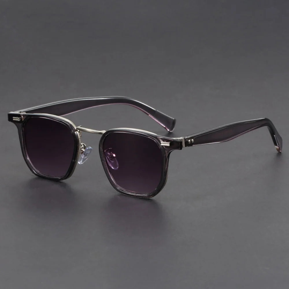 Black square acetate sunglasses with metal accents, dark lenses, and adjustable nose pads