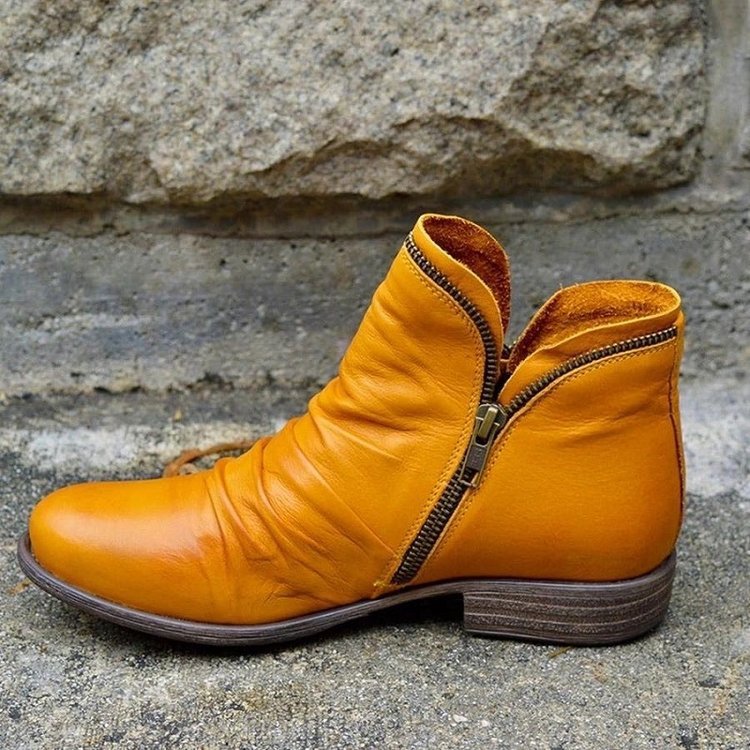Women's black vegan leather ankle boots sleek silhouette with cozy interior lining for fall winter