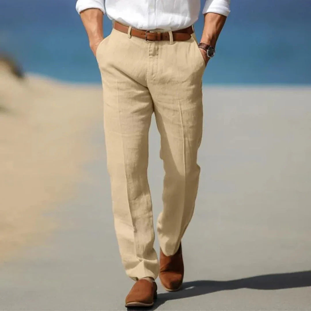 Men's beige linen tailored pants with relaxed fit and polished resort-ready silhouette