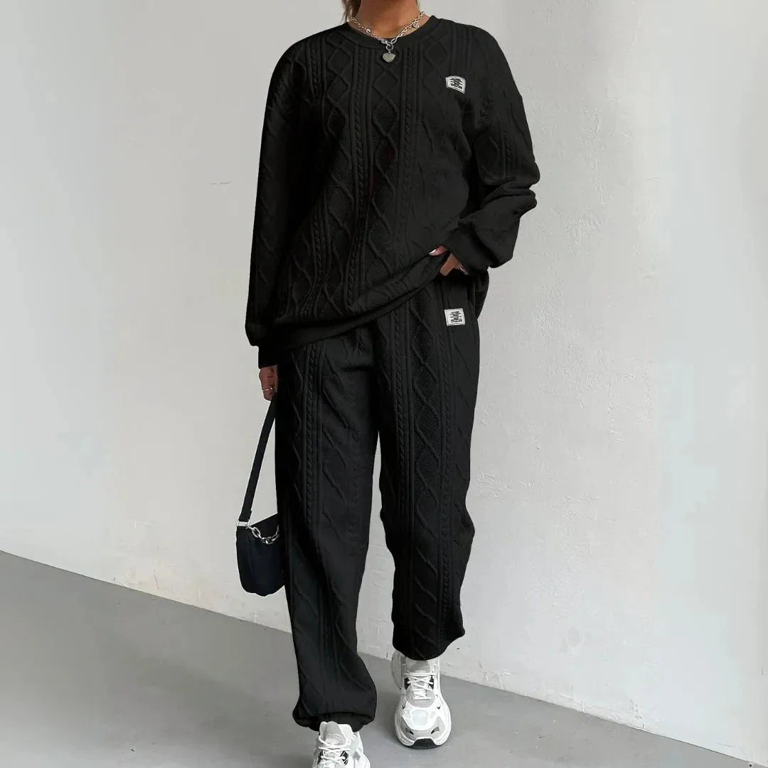 Cream cable knit two-piece lounge set with textured pattern, relaxed silhouette for cozy streetwear
