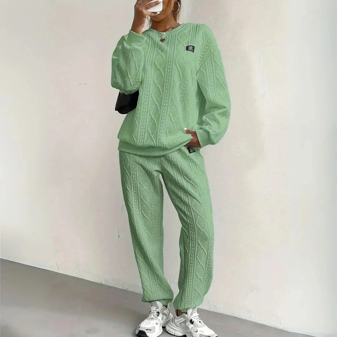 Cream cable knit two-piece lounge set with textured pattern, relaxed silhouette for cozy streetwear