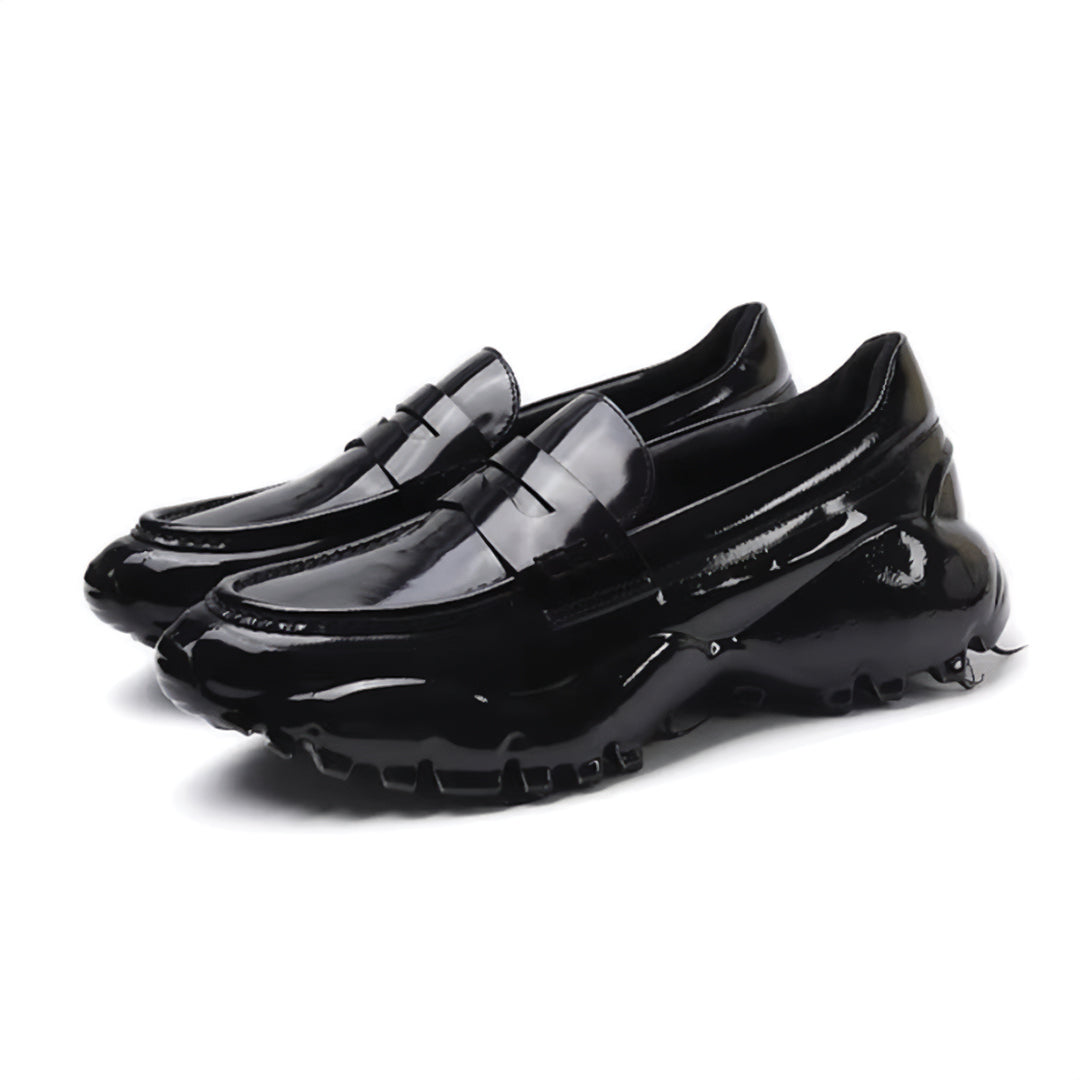 Magma Black leather loafer minimalist silhouette with bold thick enamel-coated outsole