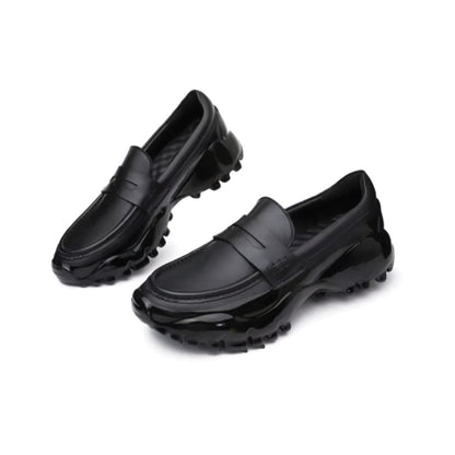 Magma Black leather loafer minimalist silhouette with bold thick enamel-coated outsole