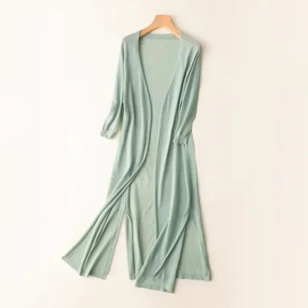 Women's lightweight open-front poncho cardigan in neutral knit, relaxed draped silhouette with silk-blend fabric