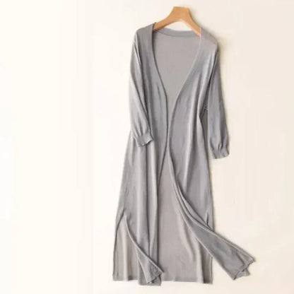 Women's lightweight open-front poncho cardigan in neutral knit, relaxed draped silhouette with silk-blend fabric