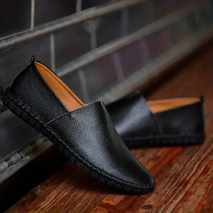 Noah brown genuine leather slip-on loafers for men with textured grain finish and flexible rubber sole