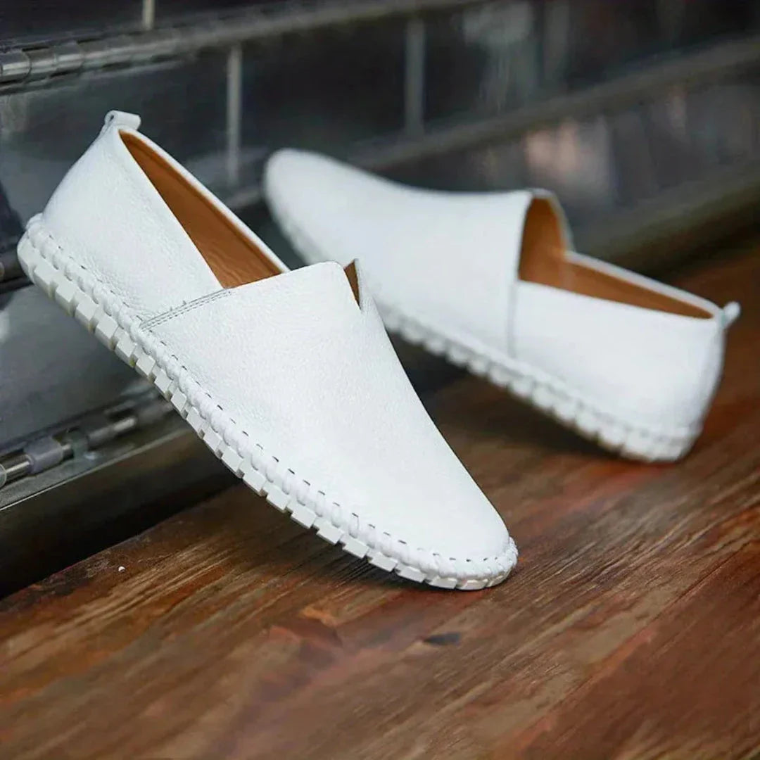 Noah brown genuine leather slip-on loafers with textured grain finish and flexible rubber sole
