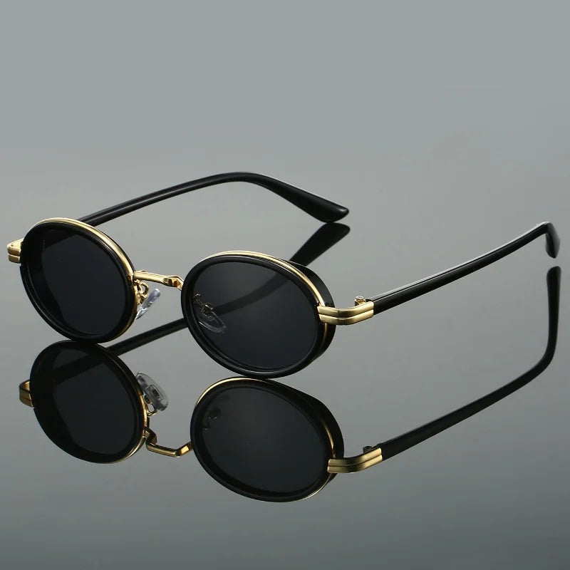 Black steampunk round sunglasses with sleek circular metal frame, deep black lenses, and vintage minimalist design