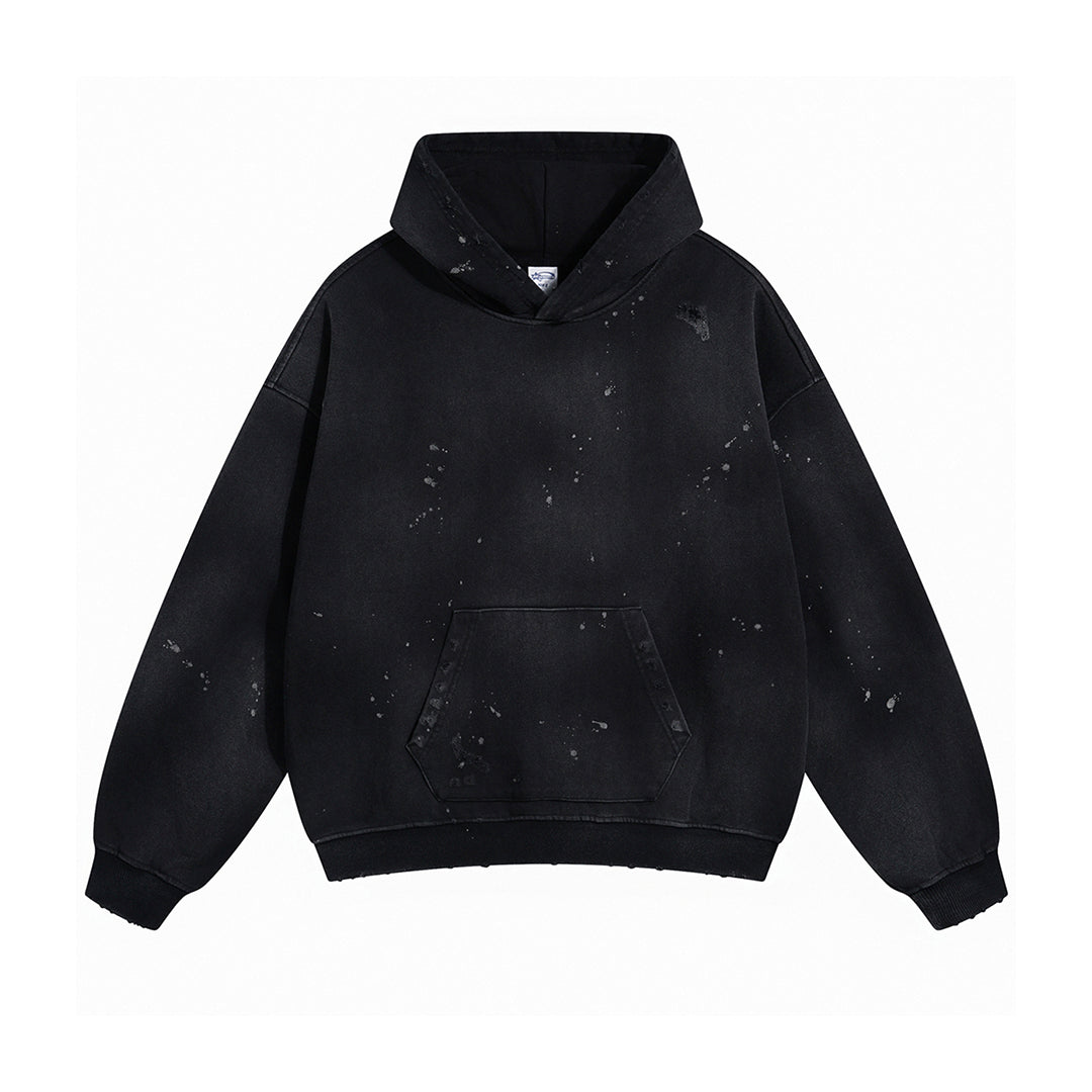 Oversized bleached distressed cotton hoodie with paint splatter detailing and waist pocket