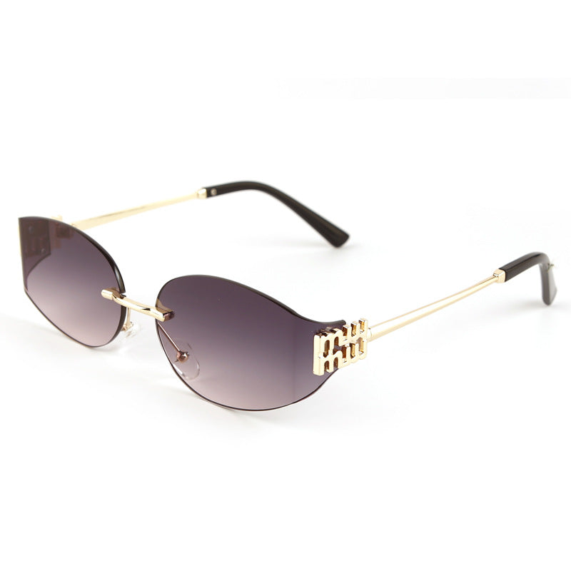 Rimless oval tinted sunglasses with minimal metal arms, futuristic sleek design for women