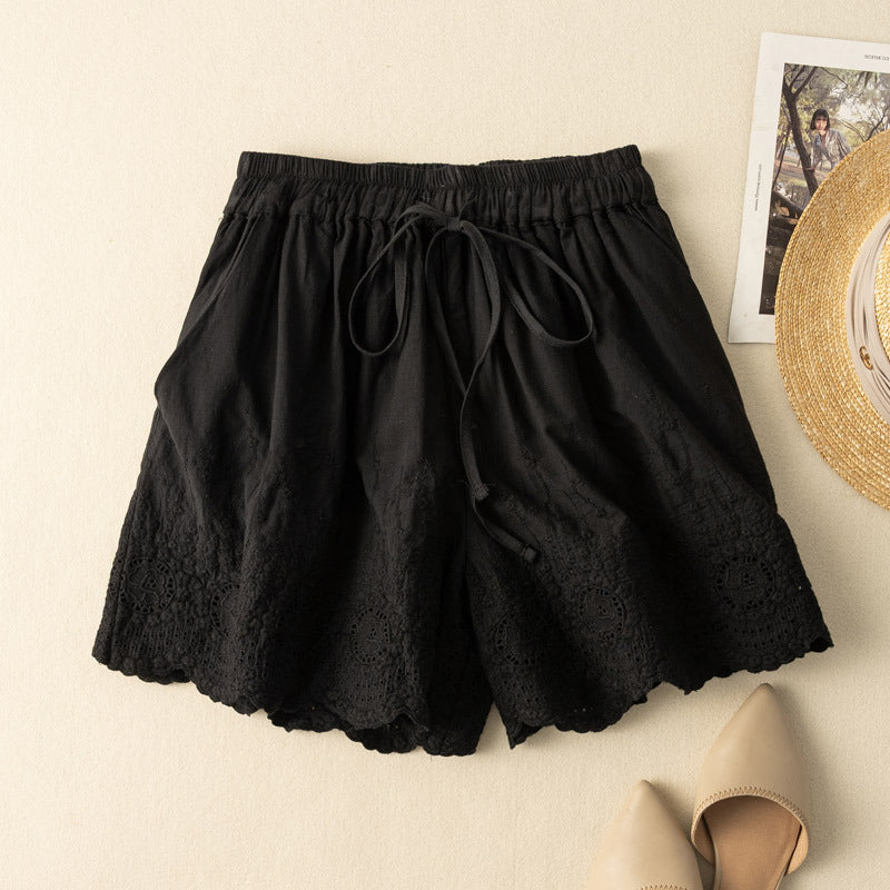 White linen-cotton blend shorts with scalloped hem and delicate eyelet embroidery detail