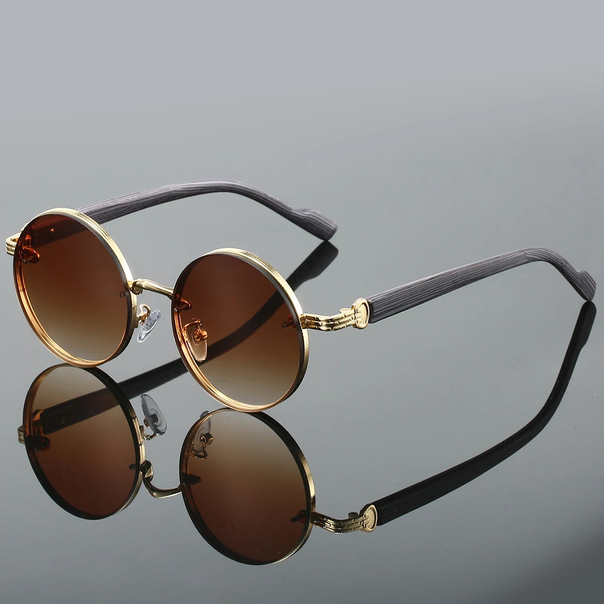 Matte black round sunglasses with textured arms and UV400 dark lenses, retro minimalist style
