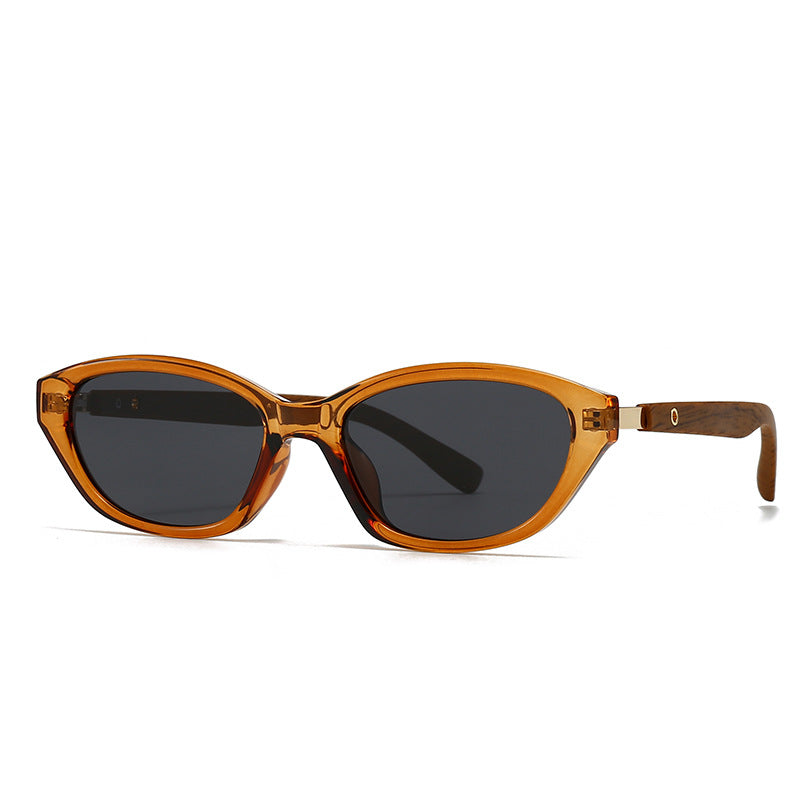 Bold matte cat-eye sunglasses with dark lenses and wood-inspired arms for UV protection