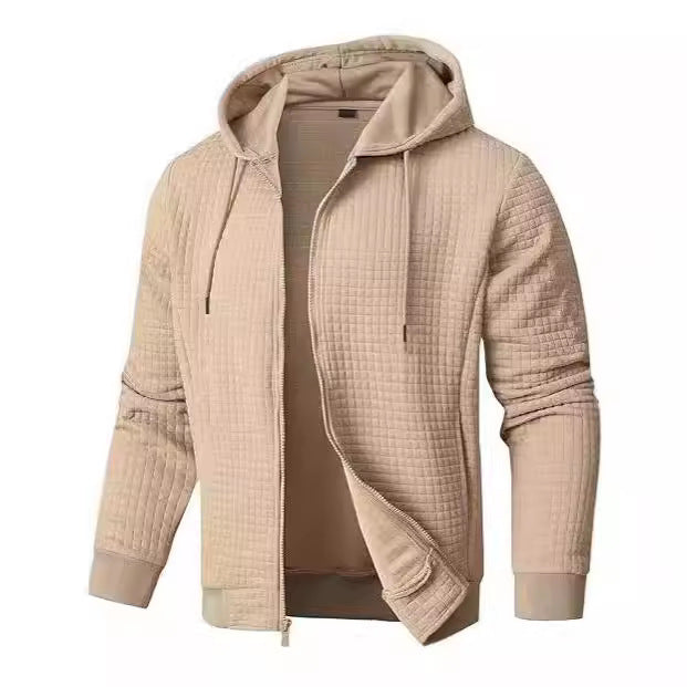 Men's black hooded quilted bomber jacket with full-zip front and waffle-knit texture