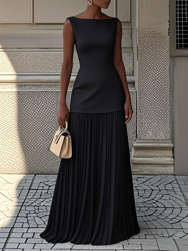 Sleeveless pleated maxi dress with figure-enhancing bodice and flowing skirt for elegant occasions