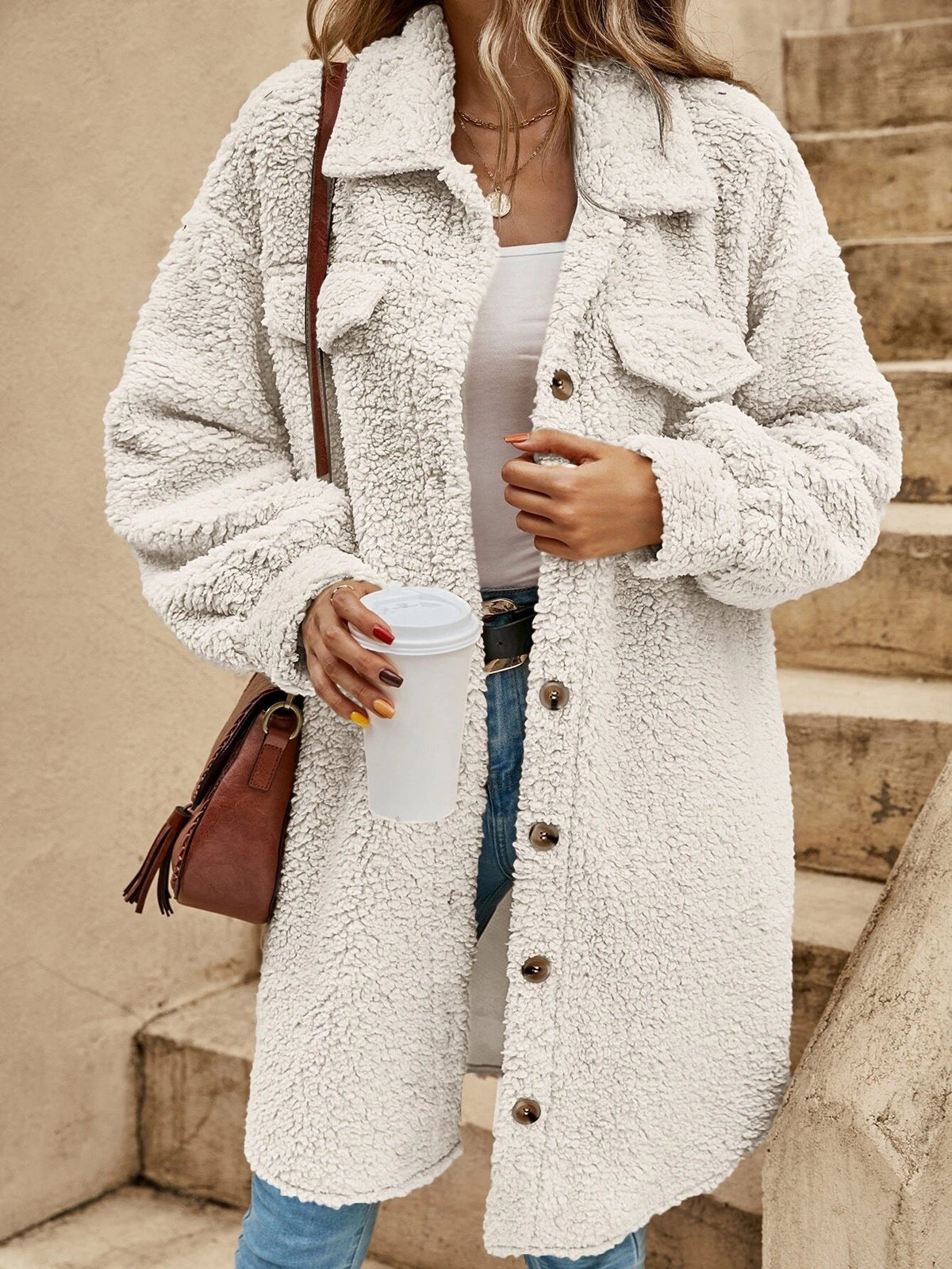 Women's oversized plush fleece long coat with button-down lapel collar, cozy winter style