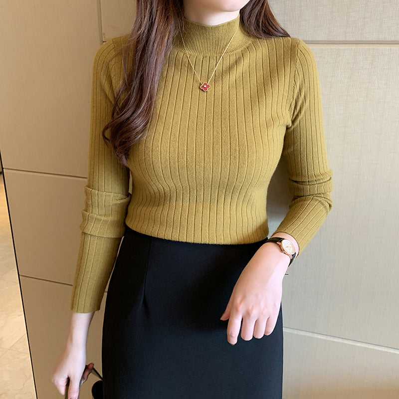 Ribbed fitted turtleneck top in soft knit fabric, cozy winter essential with textured detail