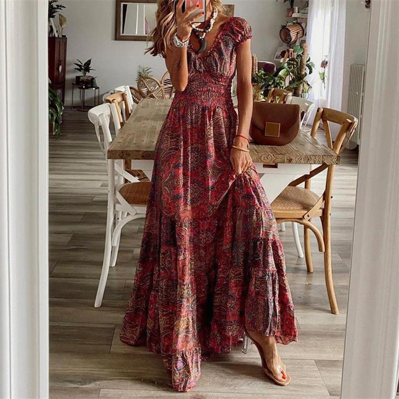Floral cotton maxi dress with V-neck, smocked bodice, and flowing tiered skirt for women