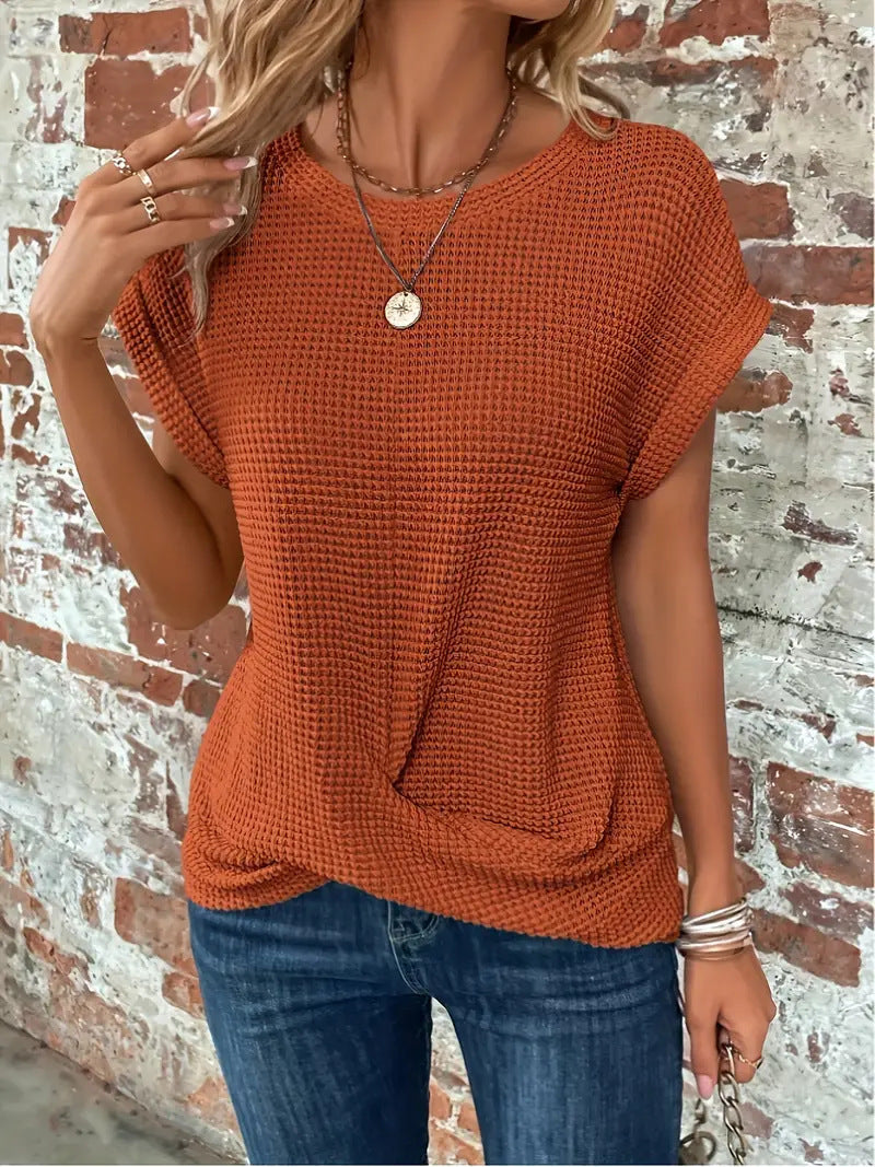Women's waffle knit casual tee with rolled sleeves and front twist detail in relaxed fit