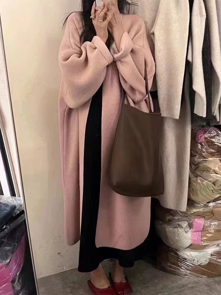 Women's oversized wool knit cardigan coat with draped open front in full-length luxe silhouette