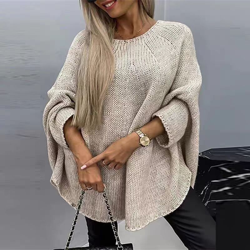 Women's cream loose-fit oversized knit sweater with cozy winter casual style and relaxed silhouette