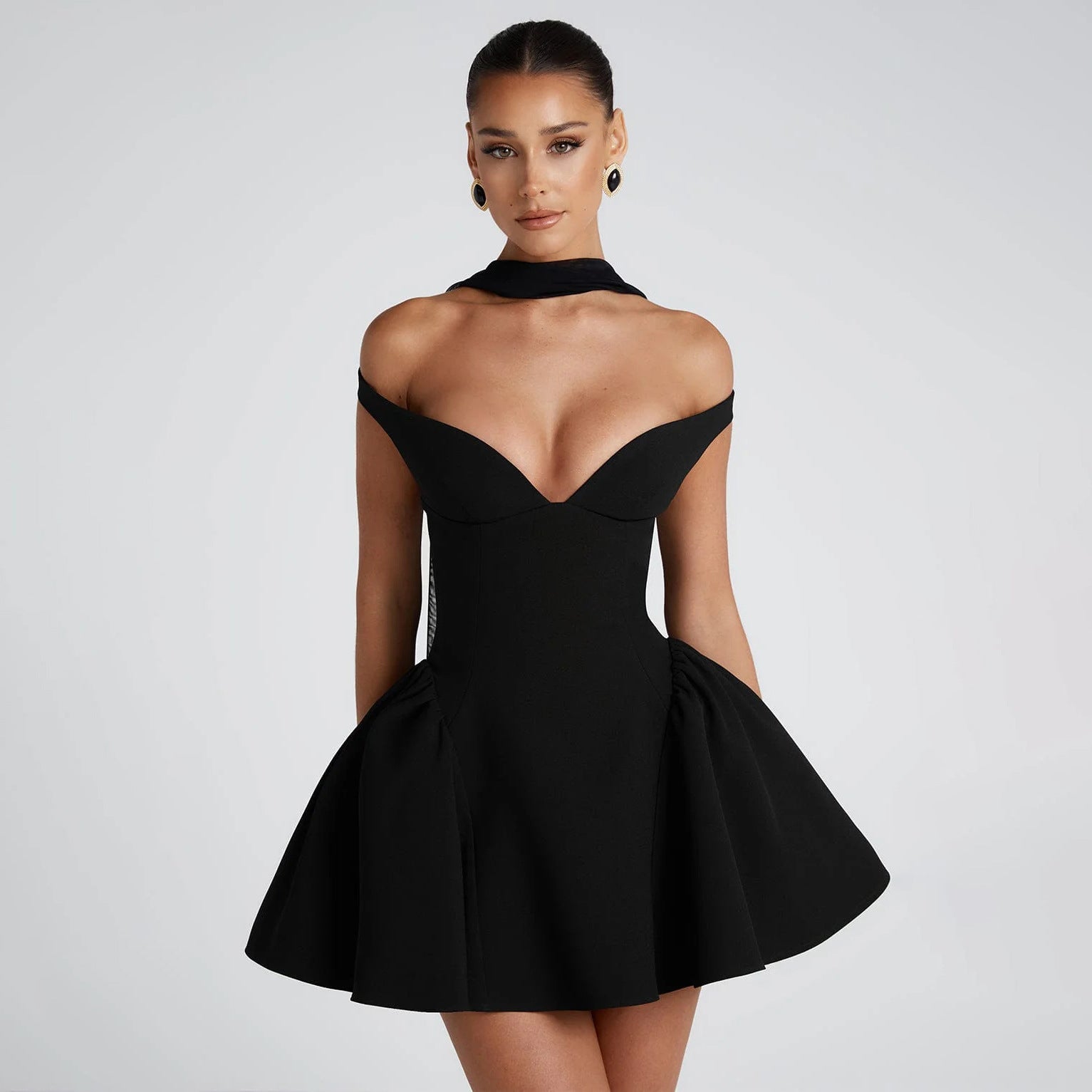 Black slim-fit off-shoulder cocktail dress with V-neck and open back detail