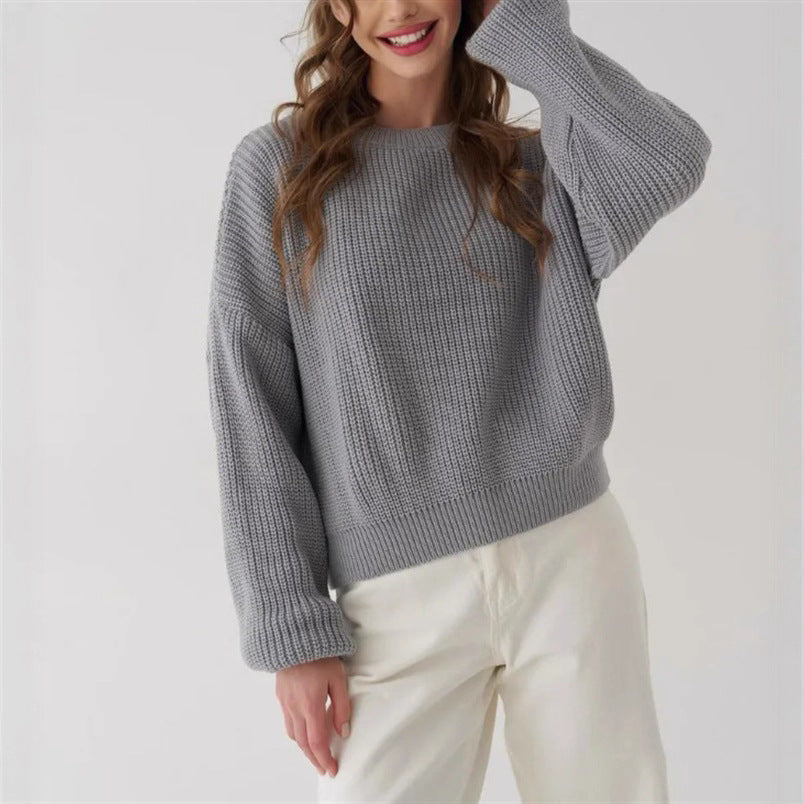 Kinsley oversized knit sweater in neutral tone with relaxed silhouette and plush soft-knit texture