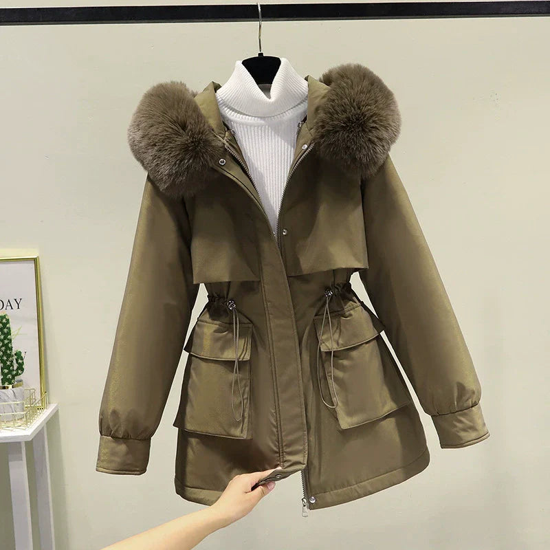 Women's tailored fit parka jacket with faux fur hood, quilted lining, zip front winter coat