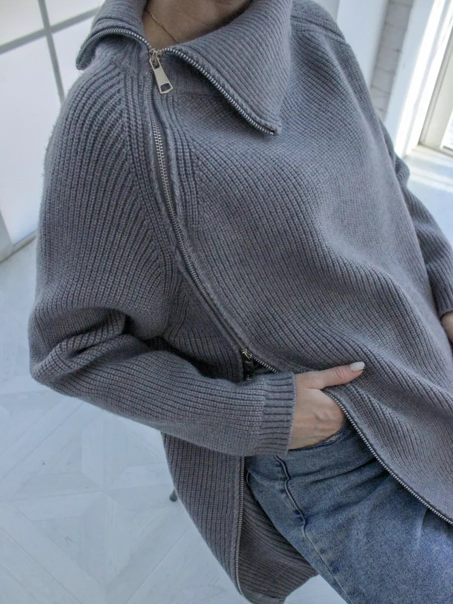 Women's oversized ribbed knit pullover sweater with asymmetrical zip and large collar