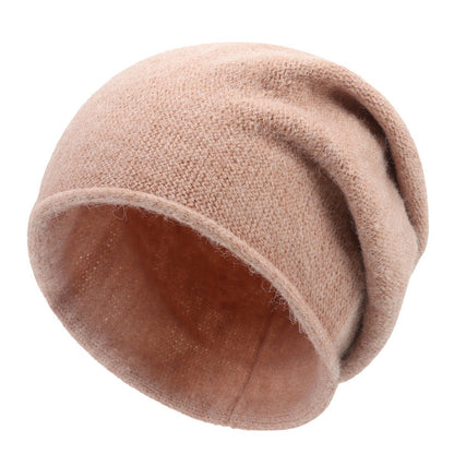 Relaxed fit slouchy beanie in neutral tone, cloud-soft knit with effortless casual style