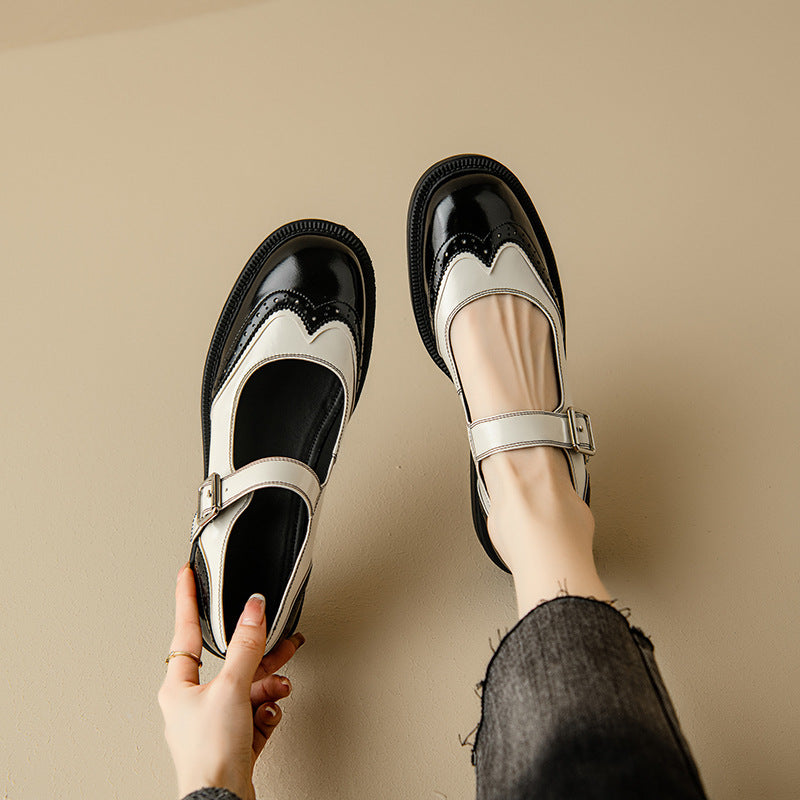 Women's two-tone dark brown cream leather Mary Jane shoes with brogue wingtip detailing and low heel