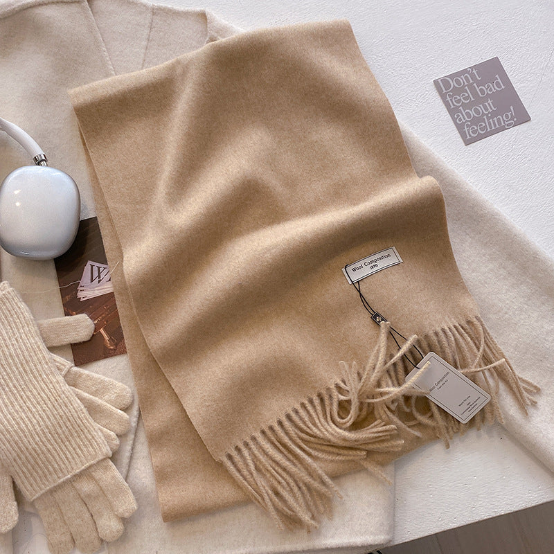 Soft plain tassel scarf shawl in neutral tone, versatile wrap style with fringe hem detail