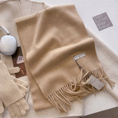 Soft plain tassel scarf shawl in neutral tone, versatile wrap style with fringe hem detail