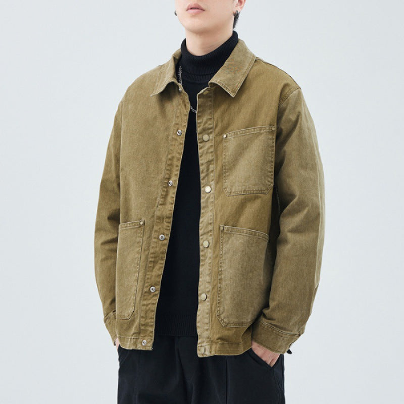 Faded vintage oversized boxy cotton jacket with multiple patch pockets and metal hardware