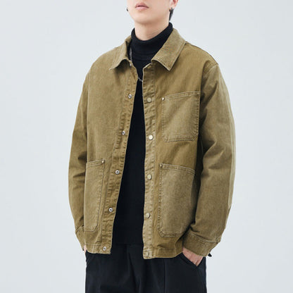 Faded vintage oversized boxy cotton jacket with multiple patch pockets and metal hardware