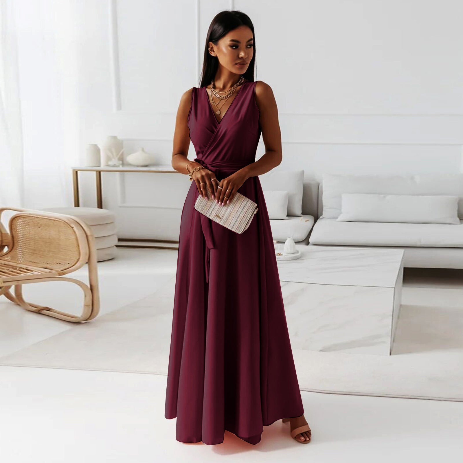 Women's sleeveless V-neck wrap maxi dress with waist-defining belt, elegant flowy silhouette