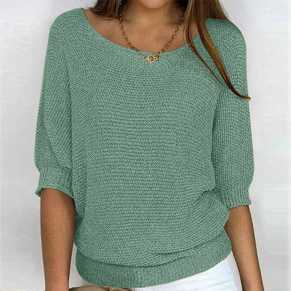 Cozy oversized knit sweater in neutral tones with featherlight soft fabric and flattering relaxed silhouette