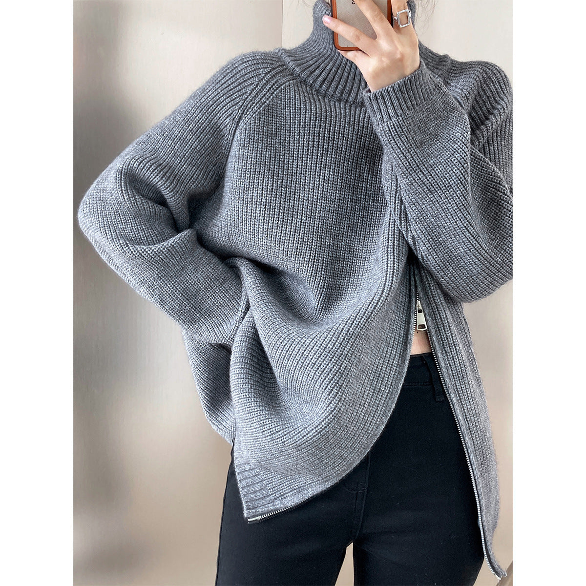 Women's wool blend oversized knit sweater with high collar and side zipper in cozy neutral tone