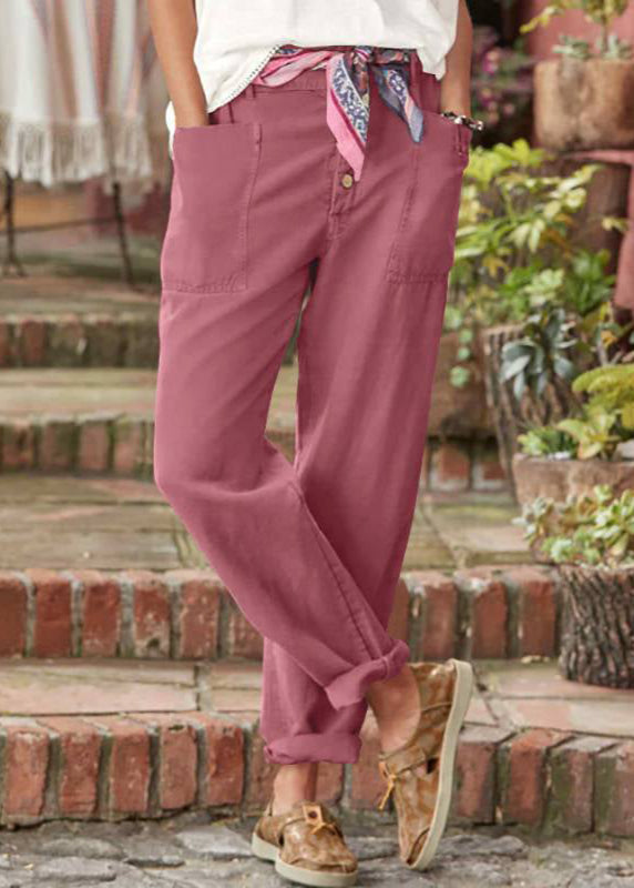 Elegant relaxed-fit trousers in soft neutral tones with structured drape for effortless summer style