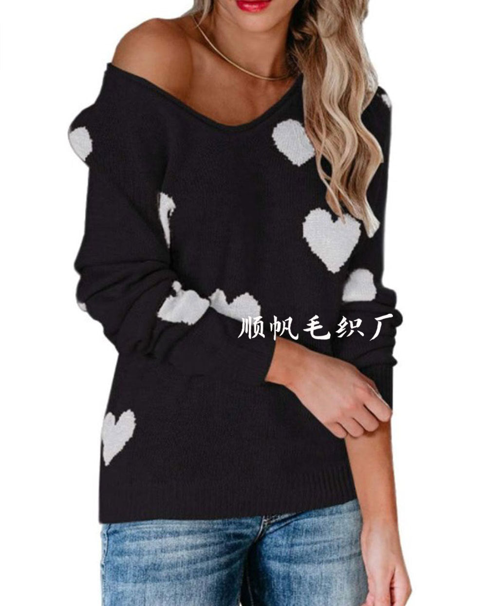 Cream relaxed-fit unisex knit sweater with all-over heart pattern for cozy fall style