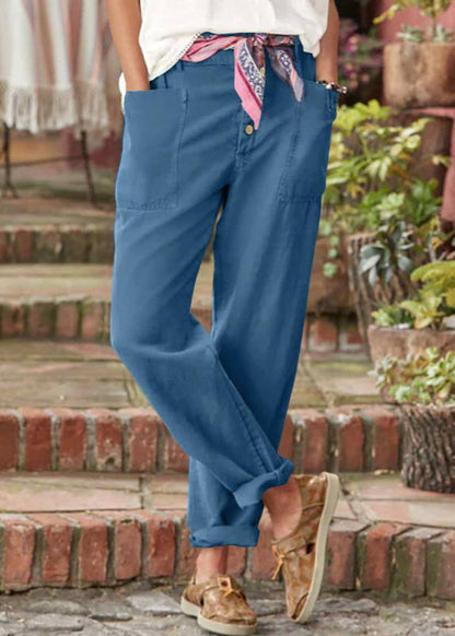 Elegant relaxed-fit women's trousers in neutral tones with soft structured waistband for effortless summer style