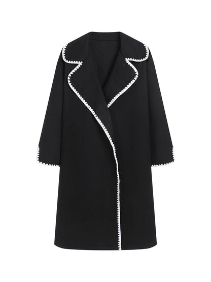 Women's oversized wool windbreaker jacket with lapel collar and delicate shell embroidery detail