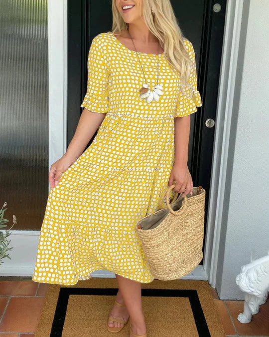 White relaxed midi dress with black dots, tiered silhouette, breathable fabric for effortless chic style
