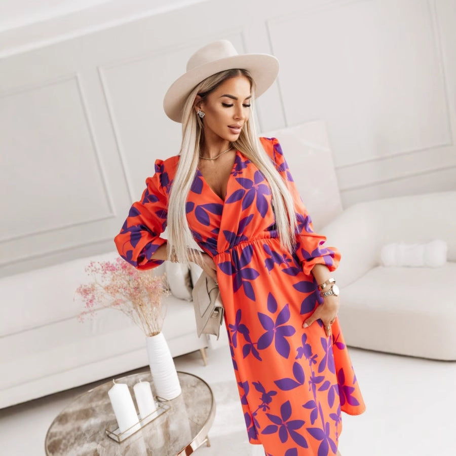 Floral print midi dress with V-neck, puff sleeves, and fitted A-line silhouette for women